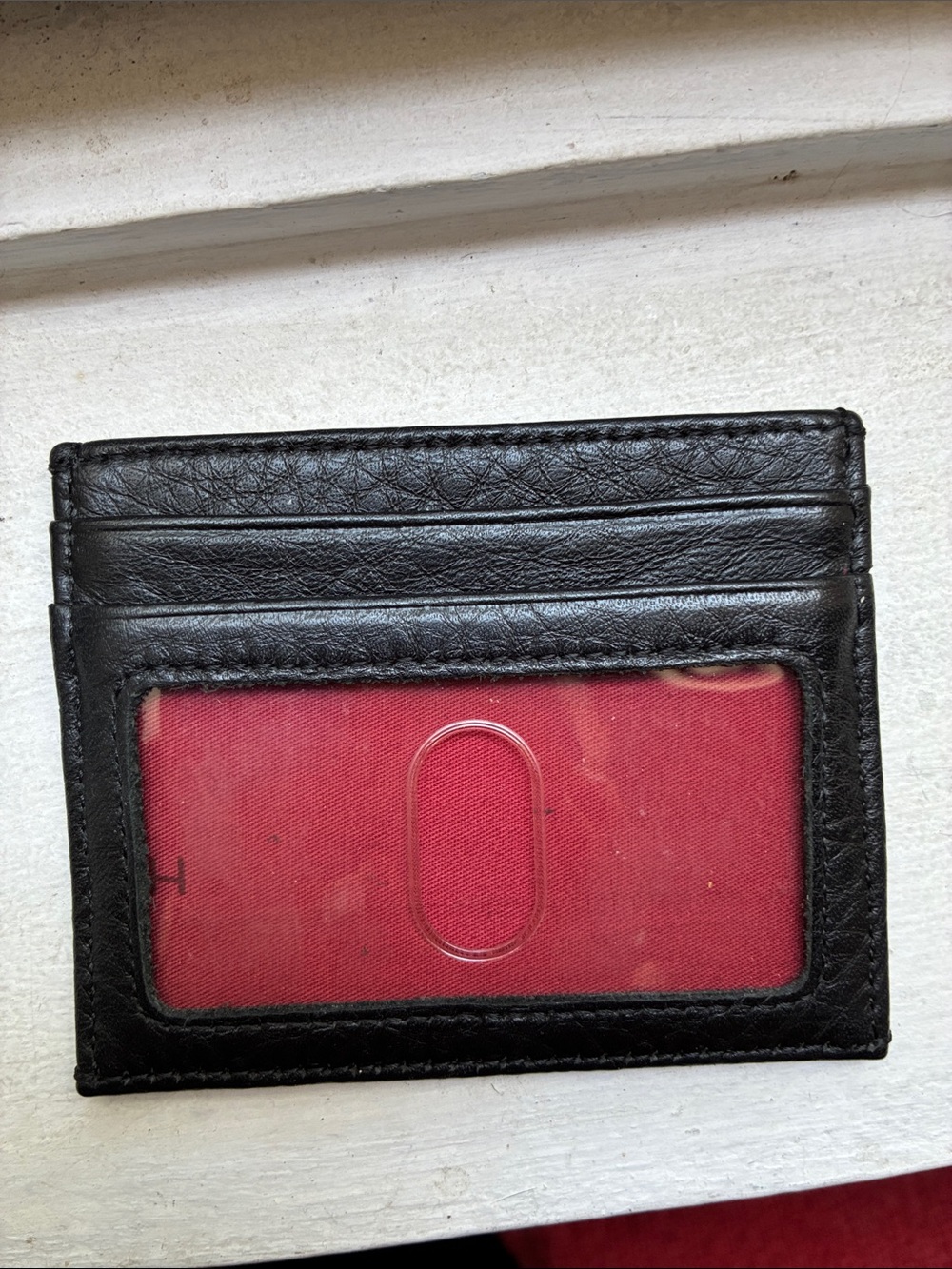 Hammit leather card case, back -4 cards holder 
front 3 holders 
Middle for cash